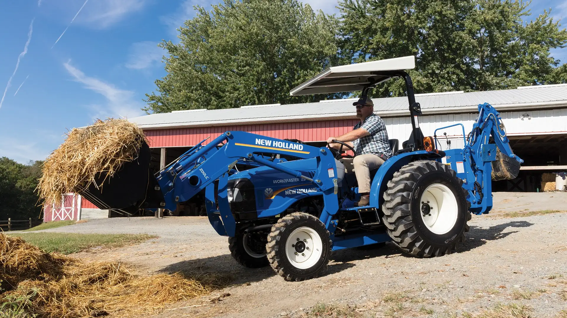 WORKMASTER compact tractor with loader attachment