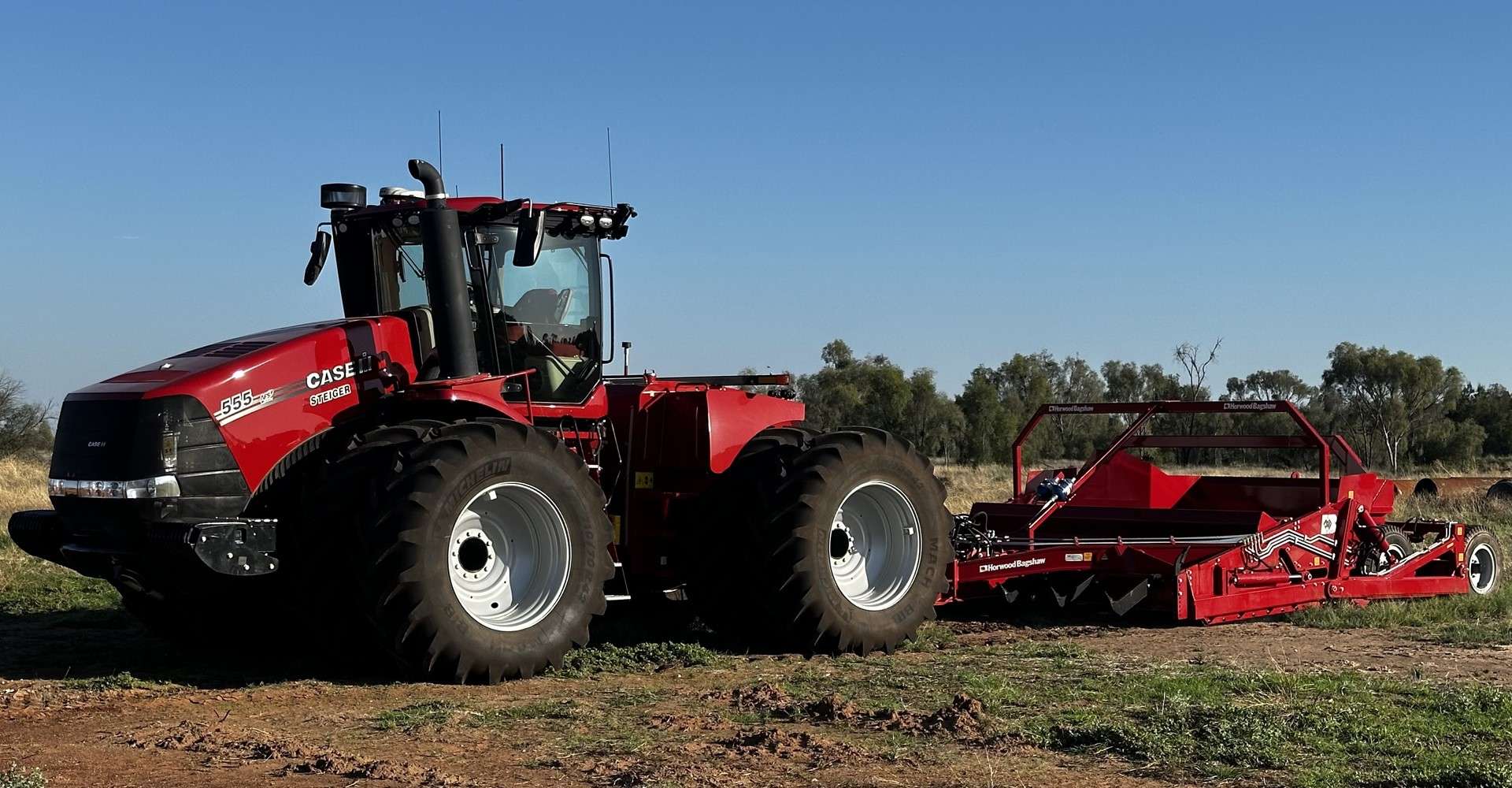 New Zealand Case IH field with farmers around tractor