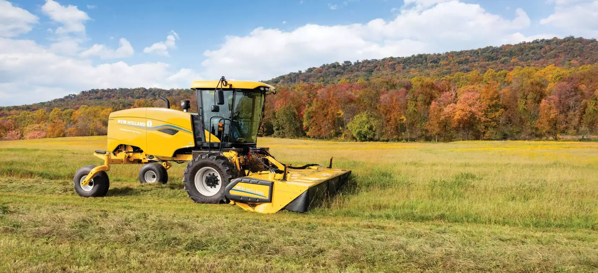Speedrower® PLUS Self-Propelled Windrower with a windrower header