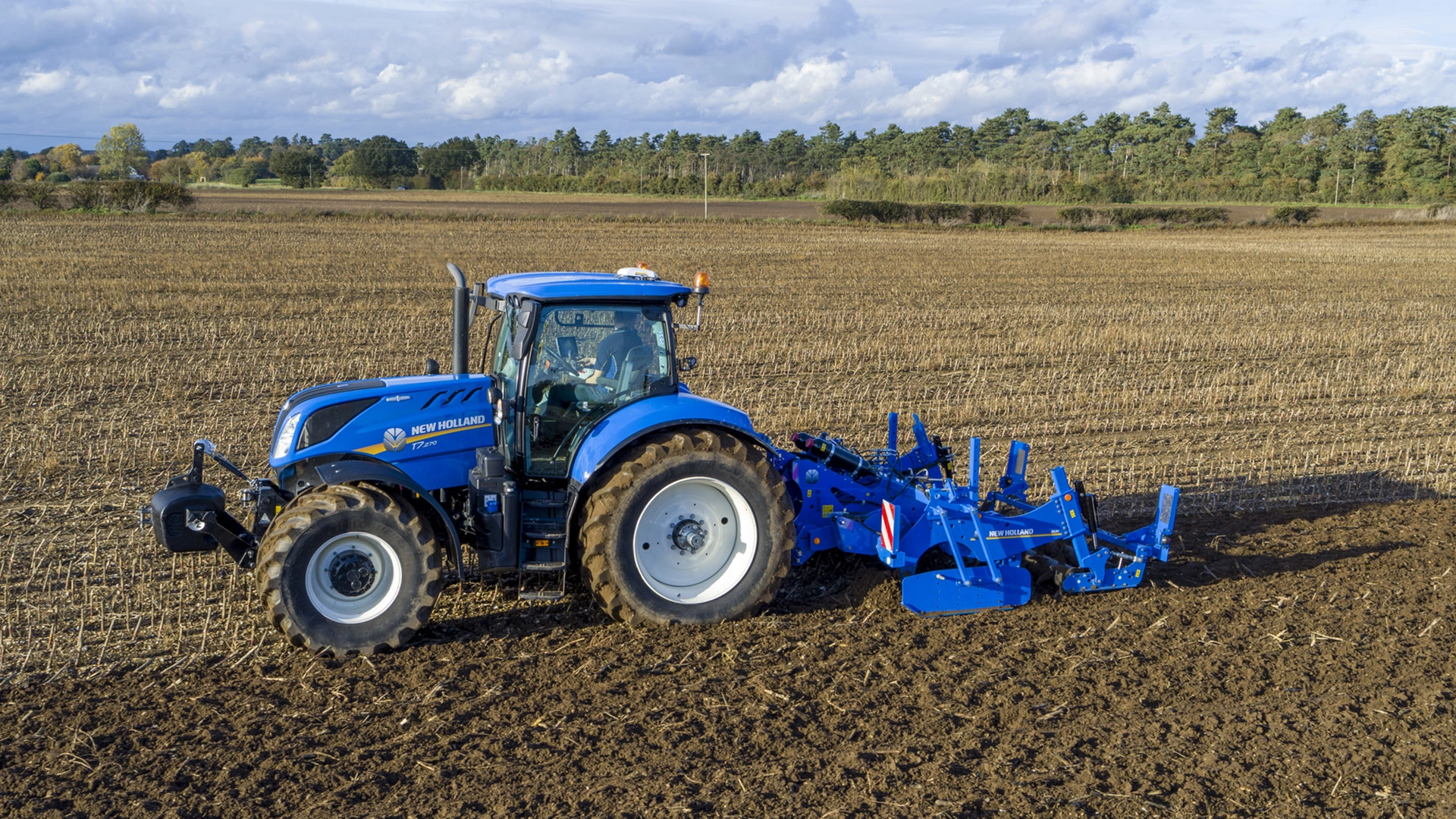 New Holland tractor and SUM & SUH Subsoilers