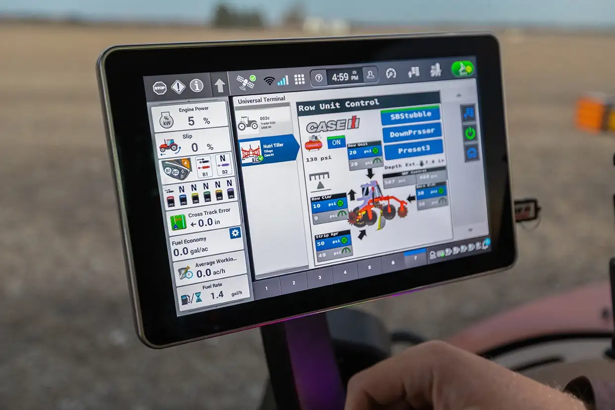 ISOBUS certified Case IH Pro 1200 display screen with graphics displayed in a tractor cab.