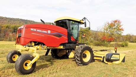 Speedrower side profile in a field.