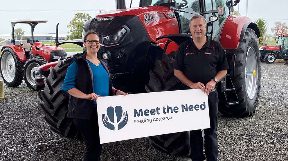 Meet the need with Case IH staff with Case IH tractor in background