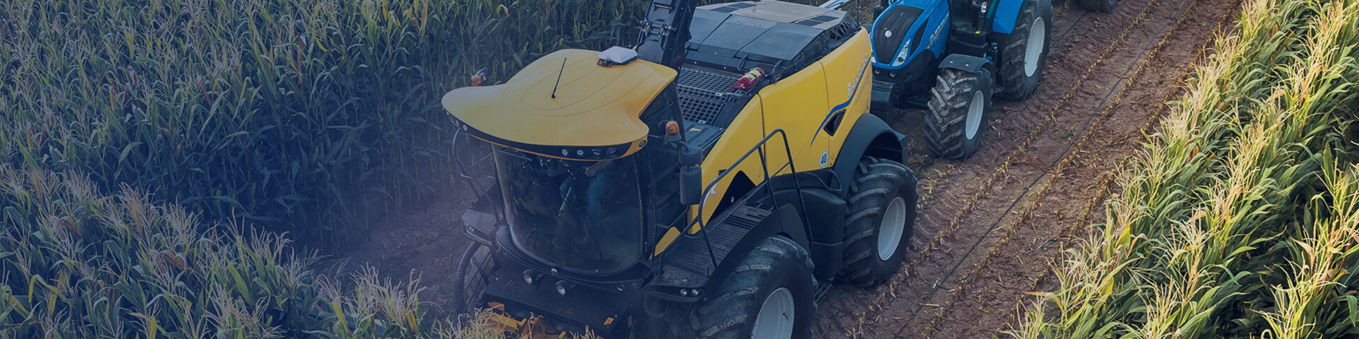 New Holland FR Forager working in grass field