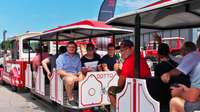 STEYR_Open_Days_Visitors_on_Factory_Tour_in_small_trains.jpg