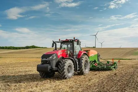Magnum Series tractor working in field with attachment