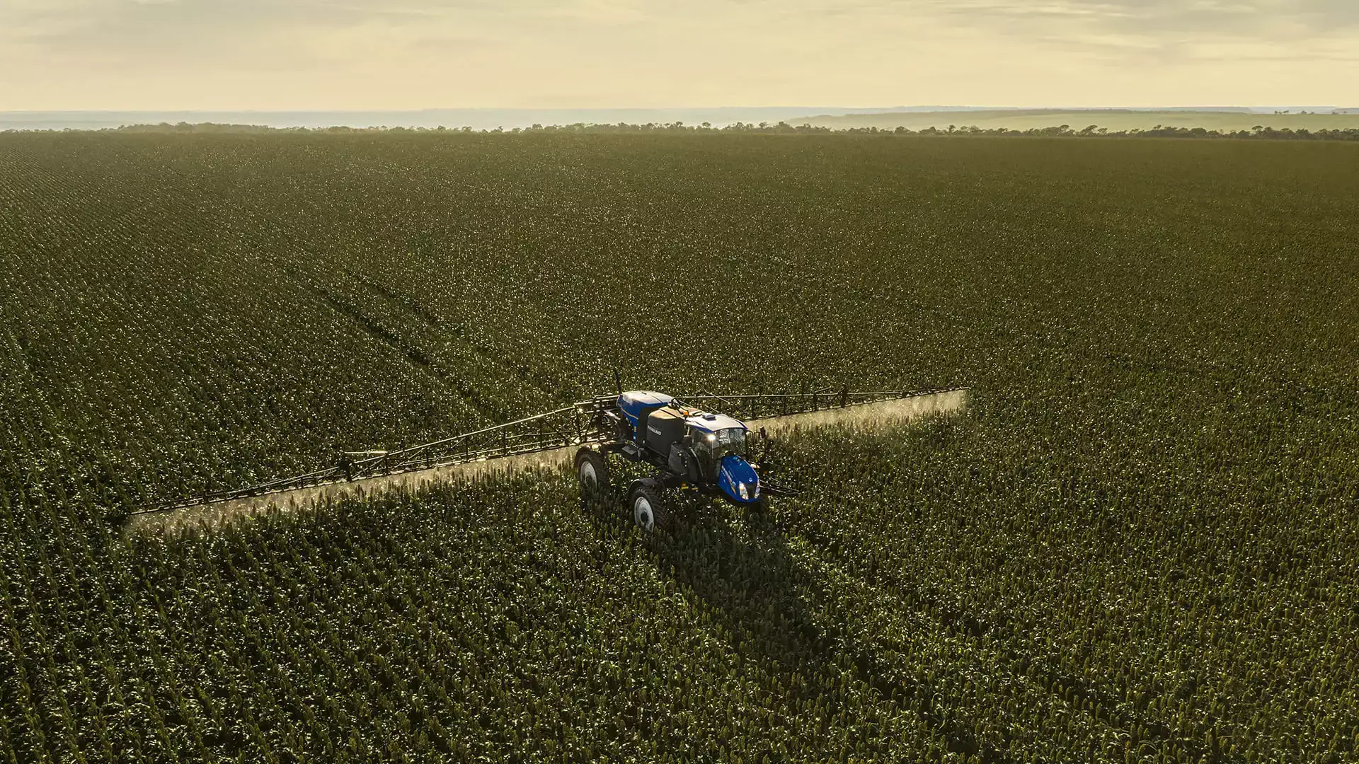 pulverizadores new holland modelo defensor 3500 hc em campo visão de cima