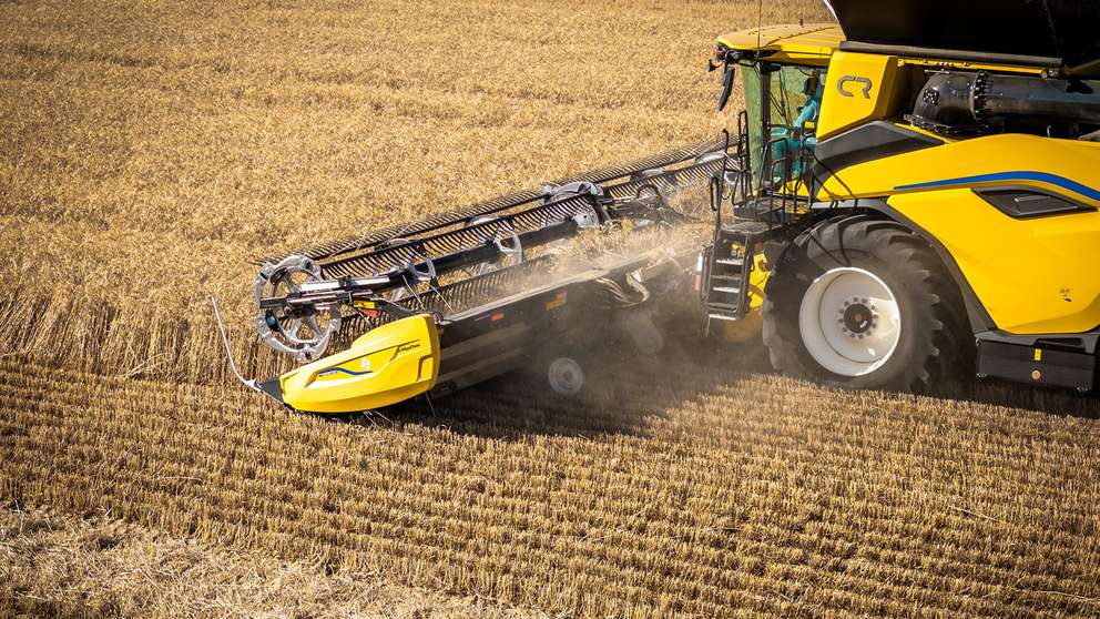 New Holland CR10 combine working in field in Dalby, Queensland