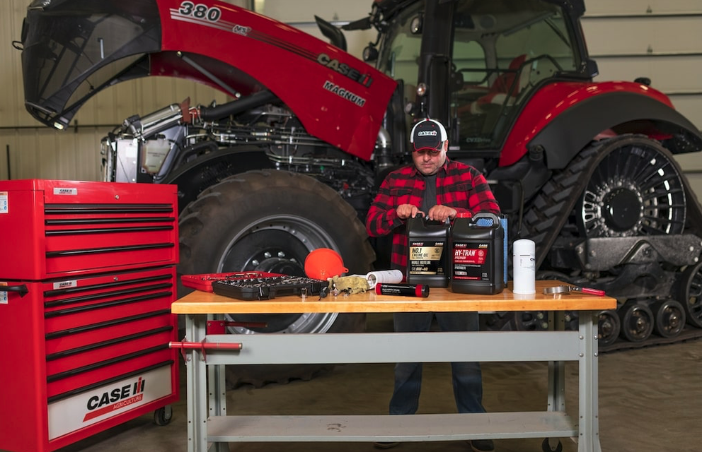 Case IH technician with Hy-Tran oil