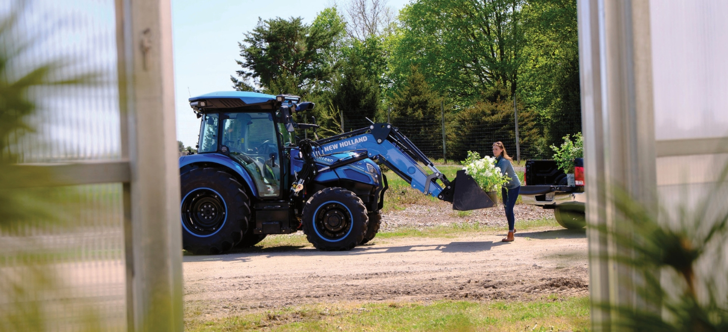 T4 Electric Tractor using loader attachment