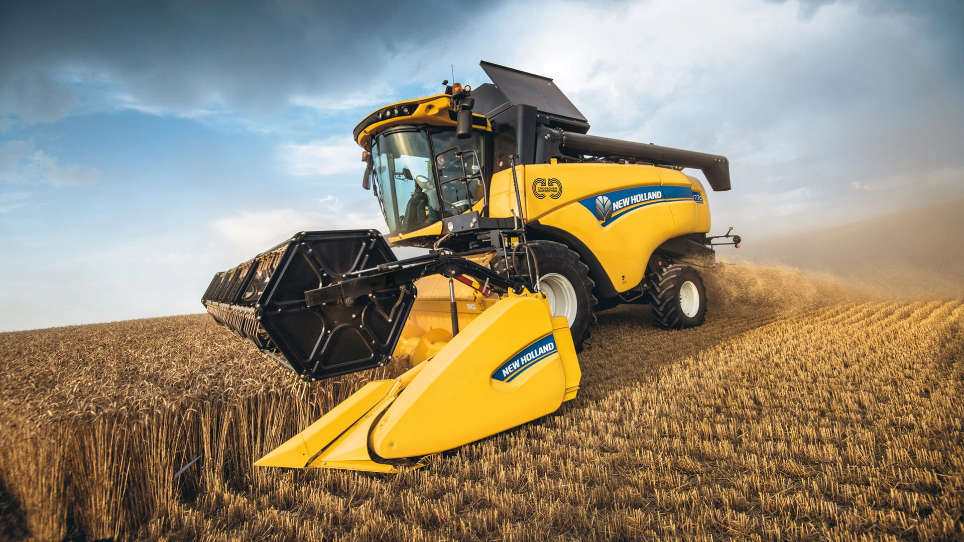 New Holland CH Combine Harvester in action, efficiently harvesting with agricultural combine header