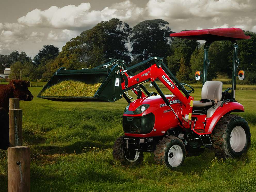 Red Case IH Farmall 25B tractor in field