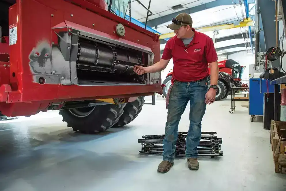 Case IH Technician inspecting equipment