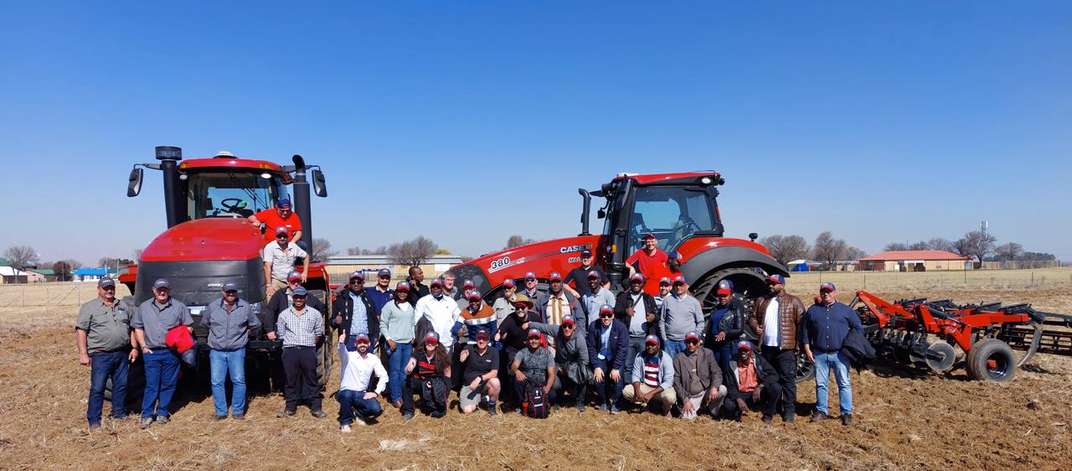 Case_IH_trainers_with_customers.jpg