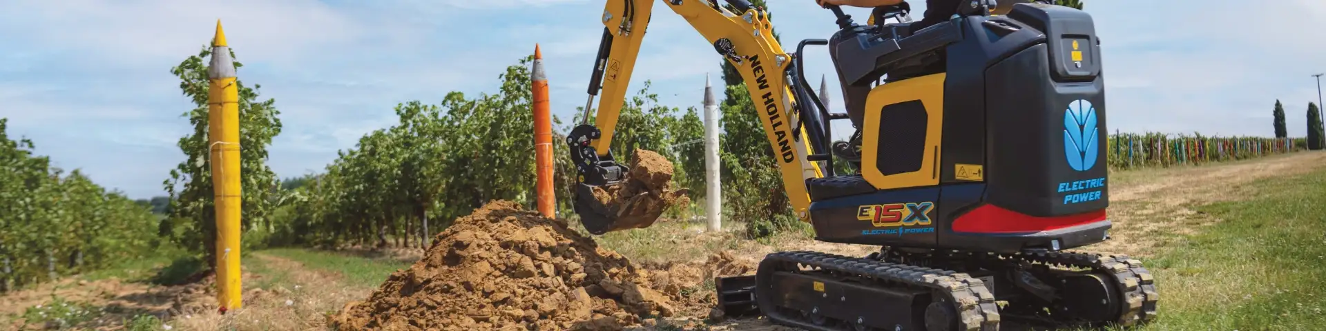 E15X Electric Mini Excavator uses bucket to scoop earth