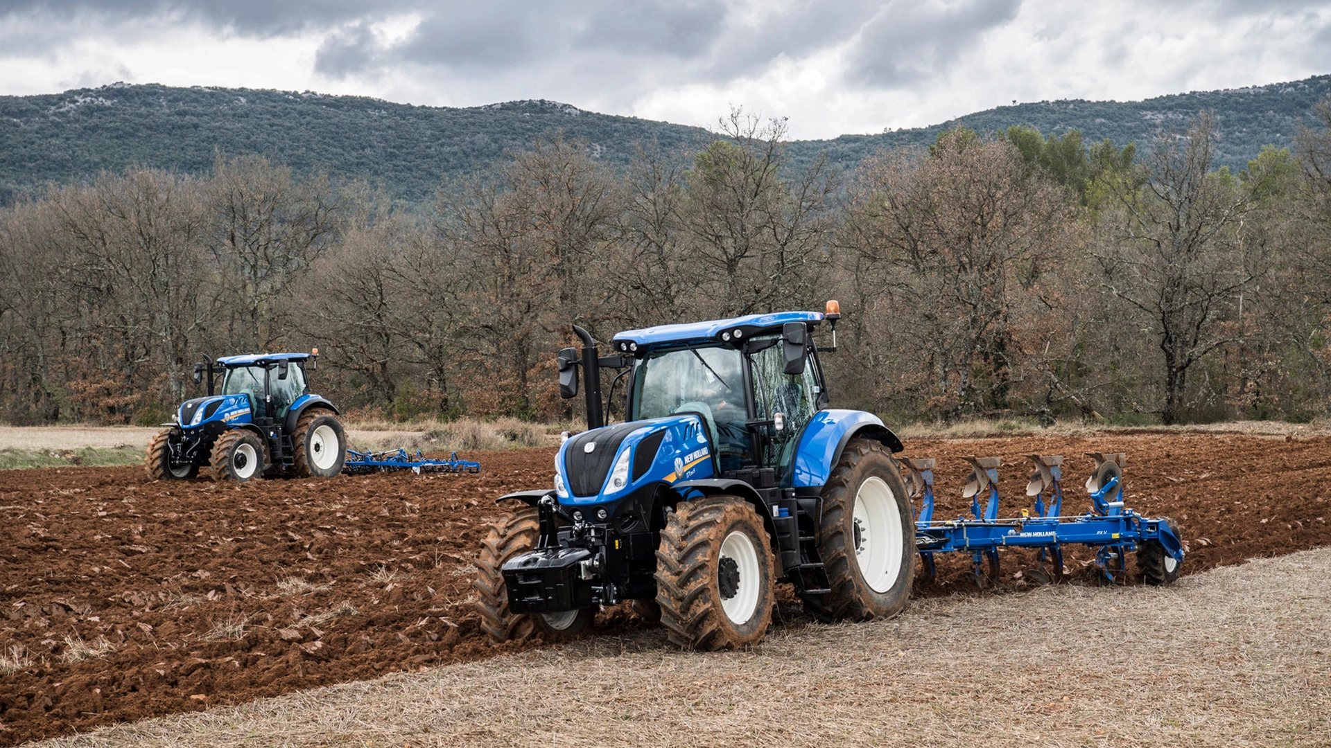 T7S Tractors working with ploughs