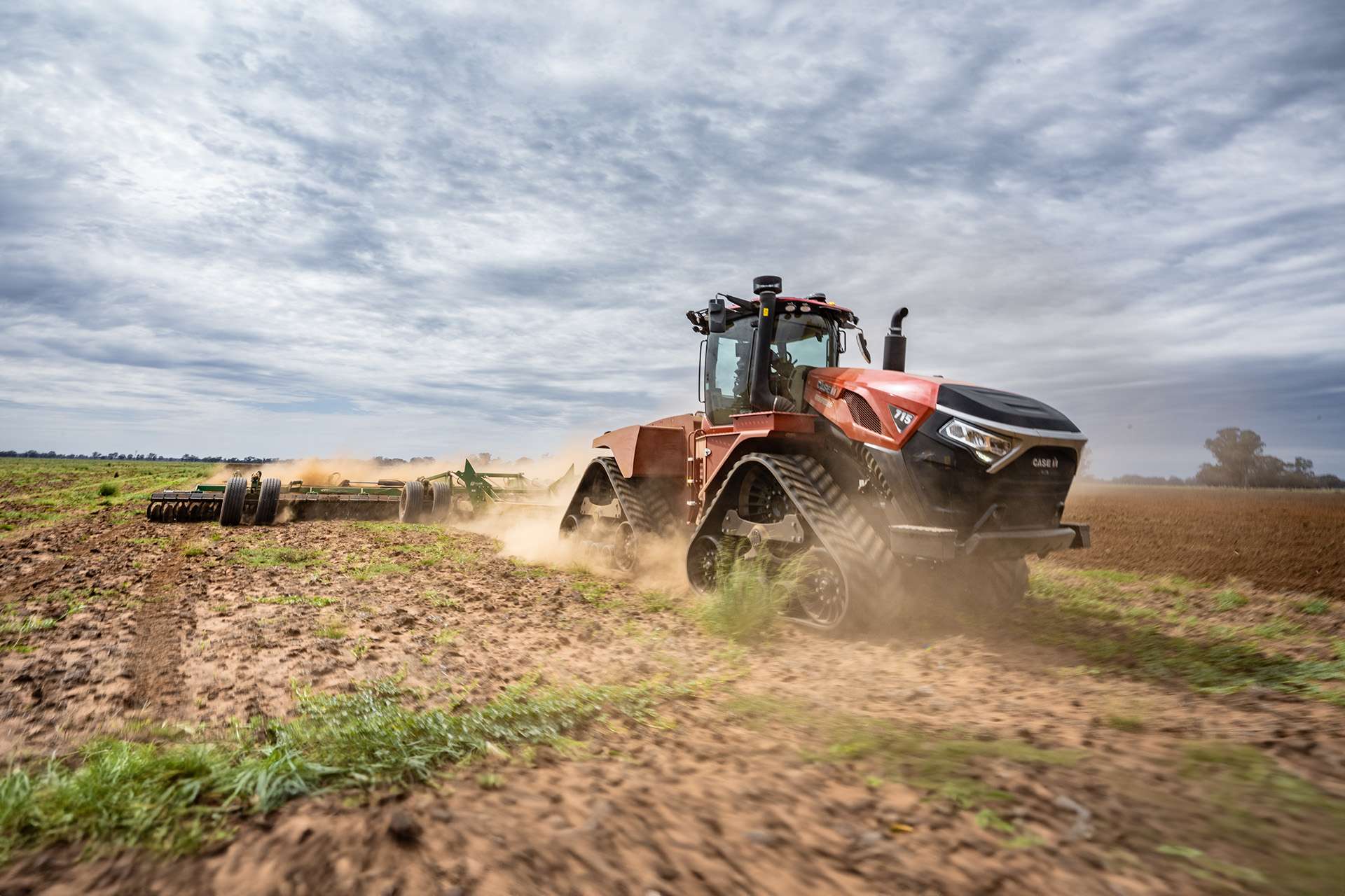 Red Case IH Steiger 715 tractor working in field