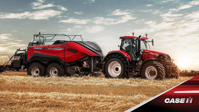 Red Case IH LB436HD baler in field with Case IH tractor in Australian conditions