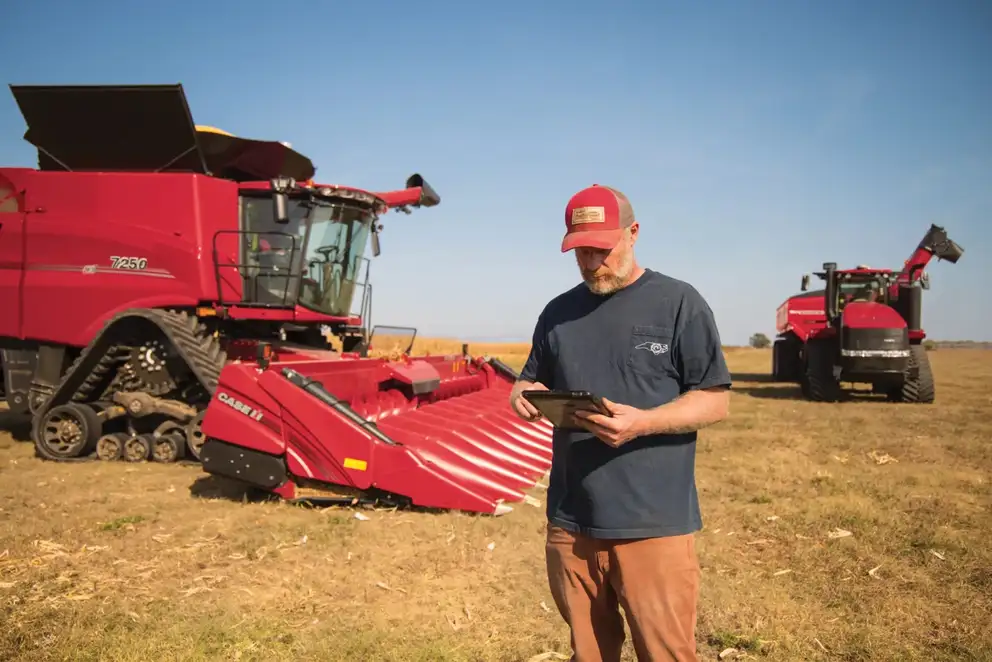 producer with tablet in front of Axial-Flow 7250