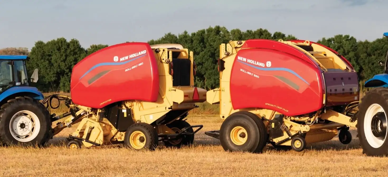 Two Roll-Belt™ Round Balers in the field 