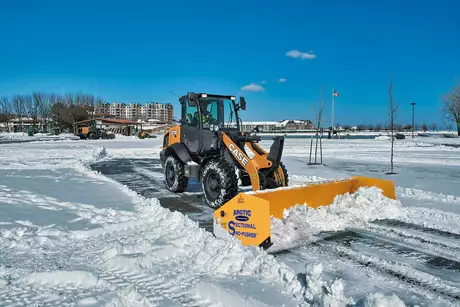 CASE-321F-Compact-Wheel-Loader-With-Arctic-Sectional-Snow-Pusher