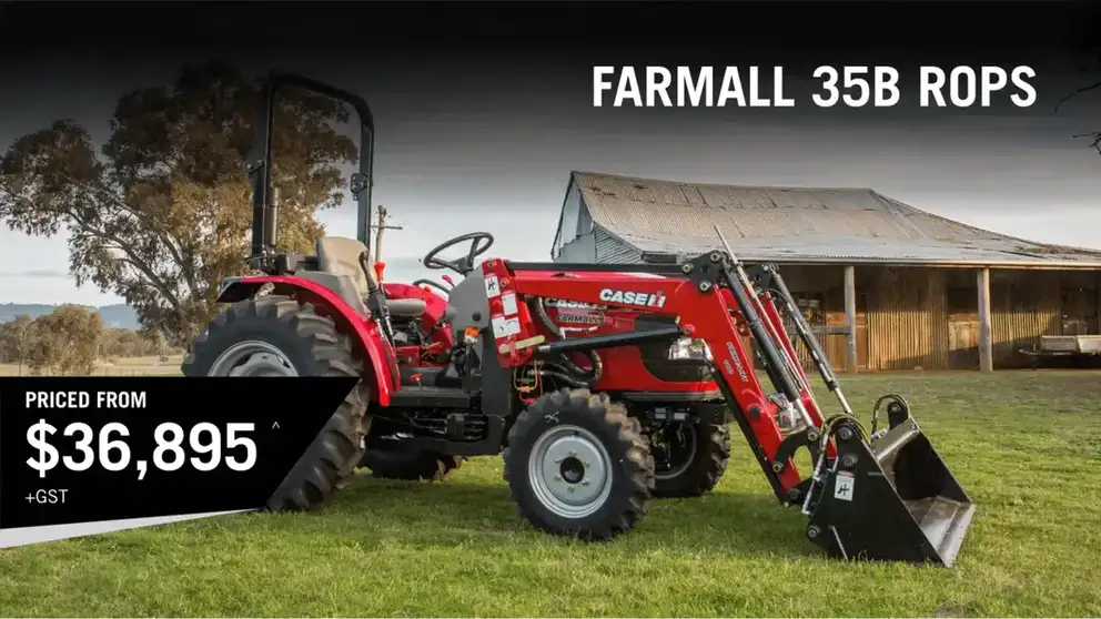 Red Case IH Farmall B tractor working in field 