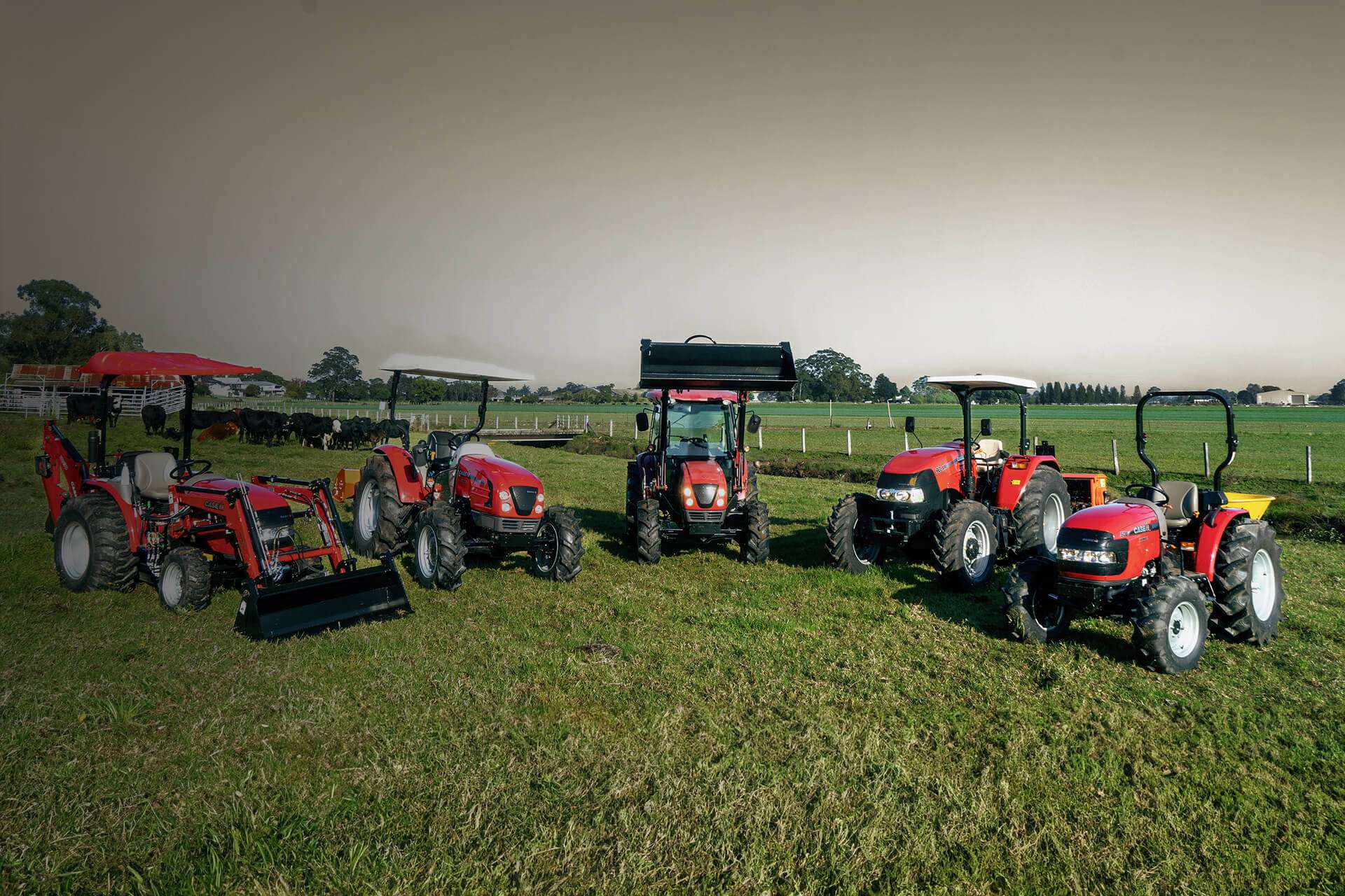 Case IH tractors sitting in field in line up of equipment