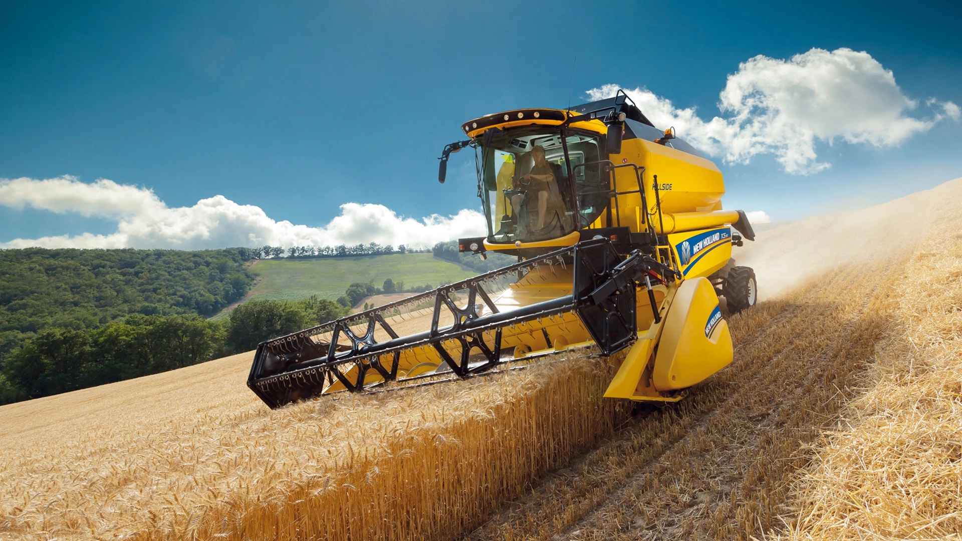 New Holland's TC Combine Harvester working on the field