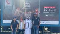 New Holland Middle East and Africa team distributes 500 meal packs to people in labor camps