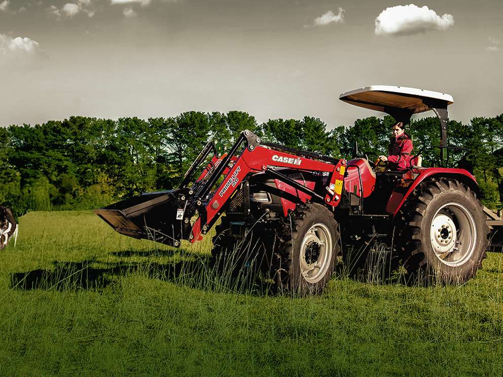 Red Case IH Farmall JXM75 tractor in field