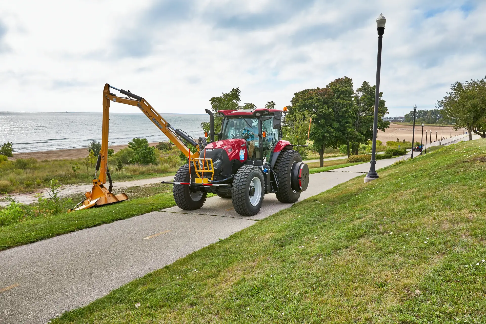 Case IH Maxxum 145 with TIger Boom Mower