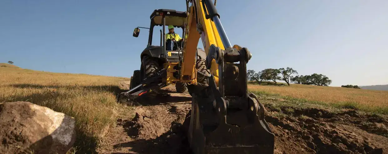 New Holland Construction Loader Backhoe Model B110D