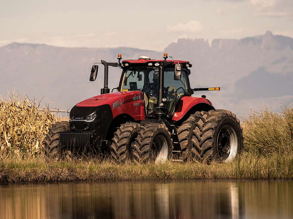 Red Case IH AFS Connect Steiger tractor sitting in field