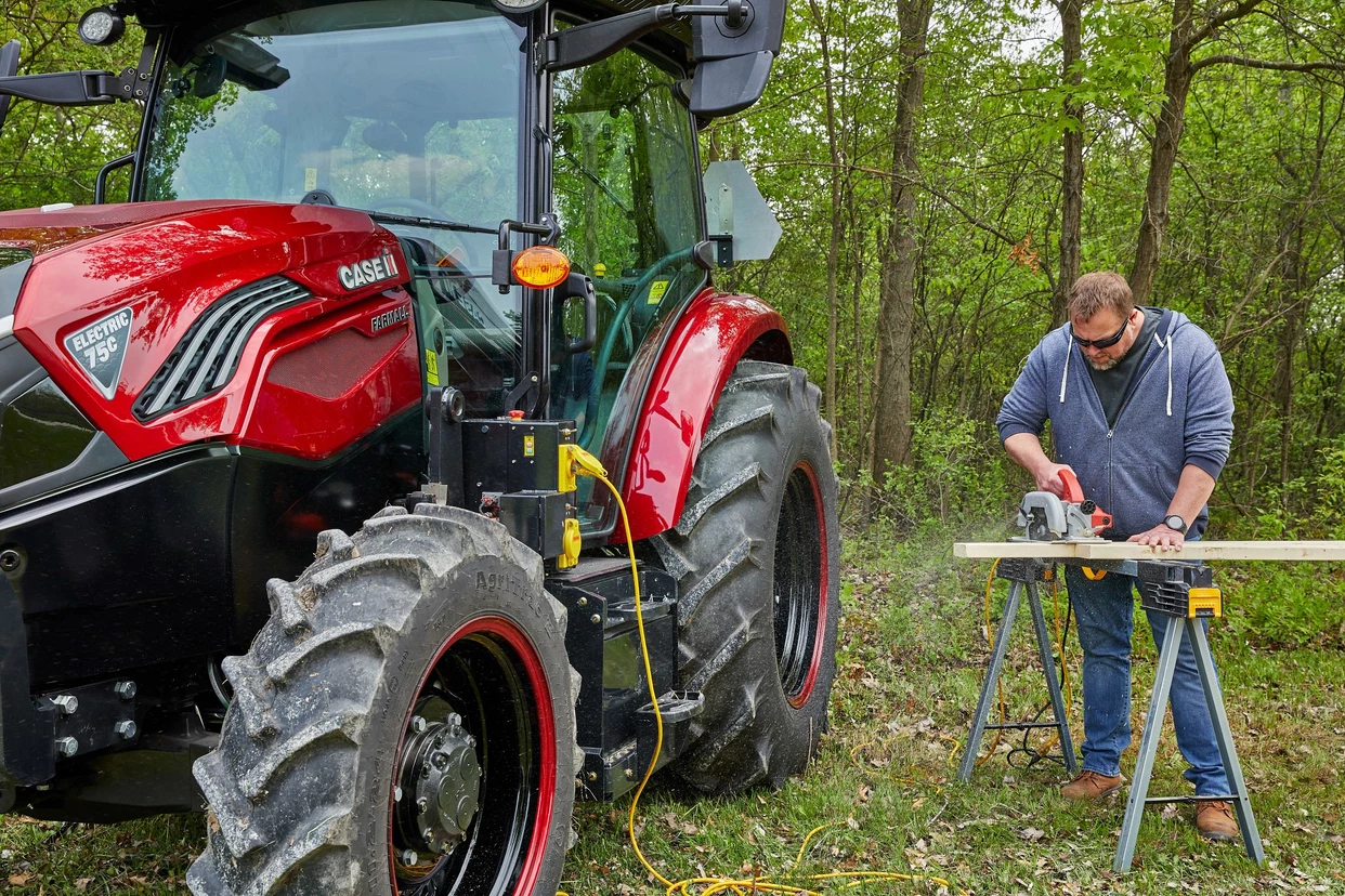 Farmall Electric 75C used as a power source for electric saw