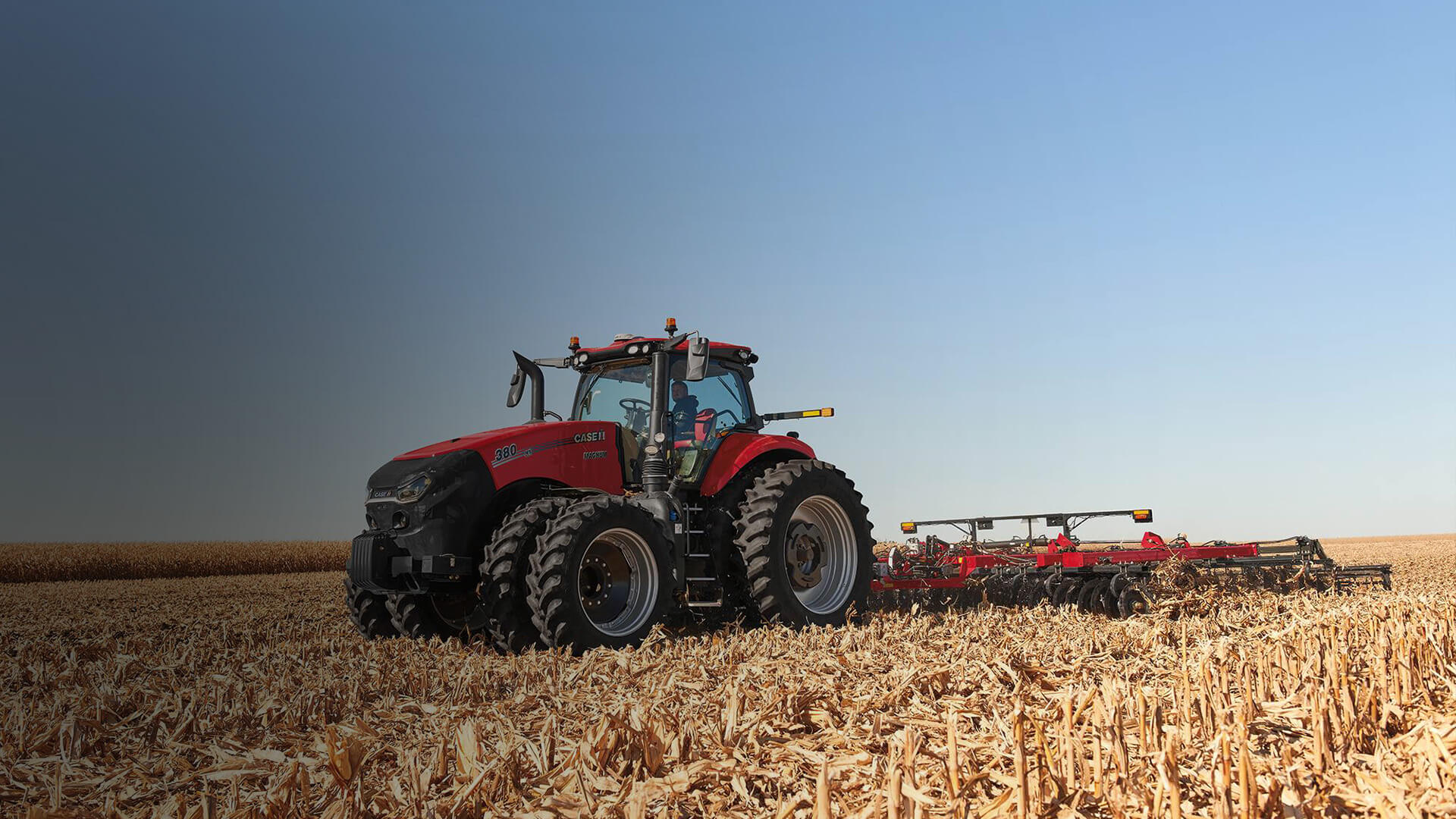 Red Case IH Mangum tractor working in field