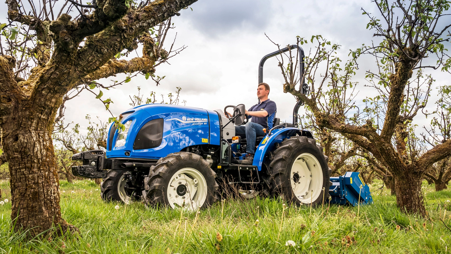 New Holland Boomer tractor in action