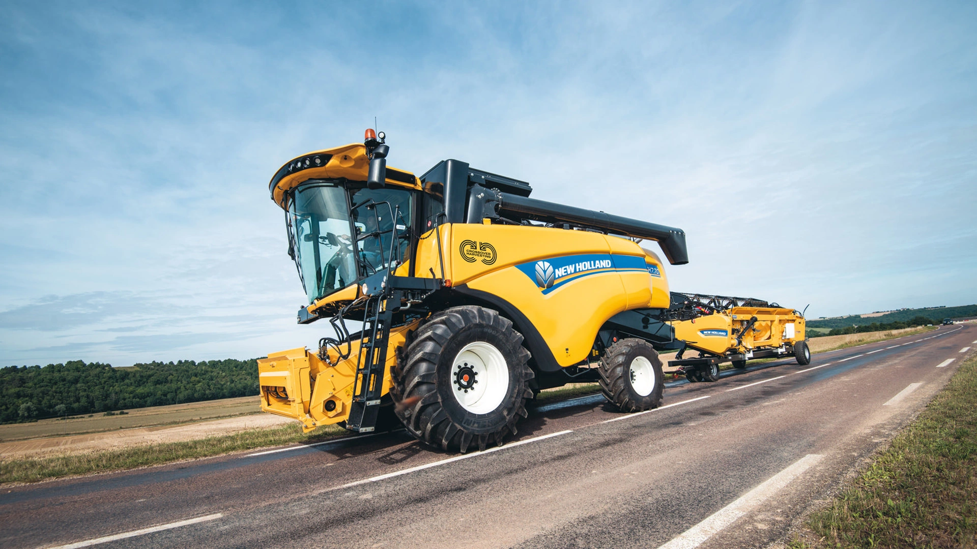 New Holland CH Combine Harvester on the road