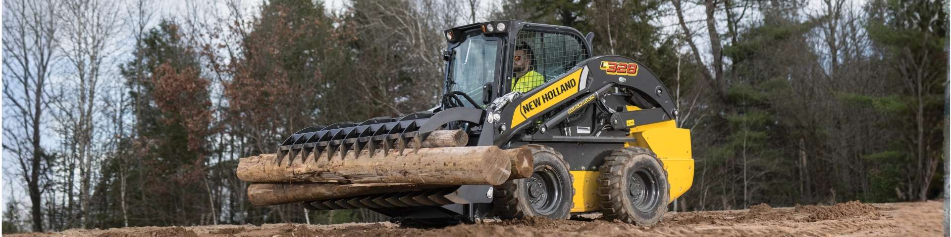 Skid steer loader lifting locks with grapple.