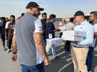 CASE Middle East and Africa team distributes 500 meal packs to people in labor camps