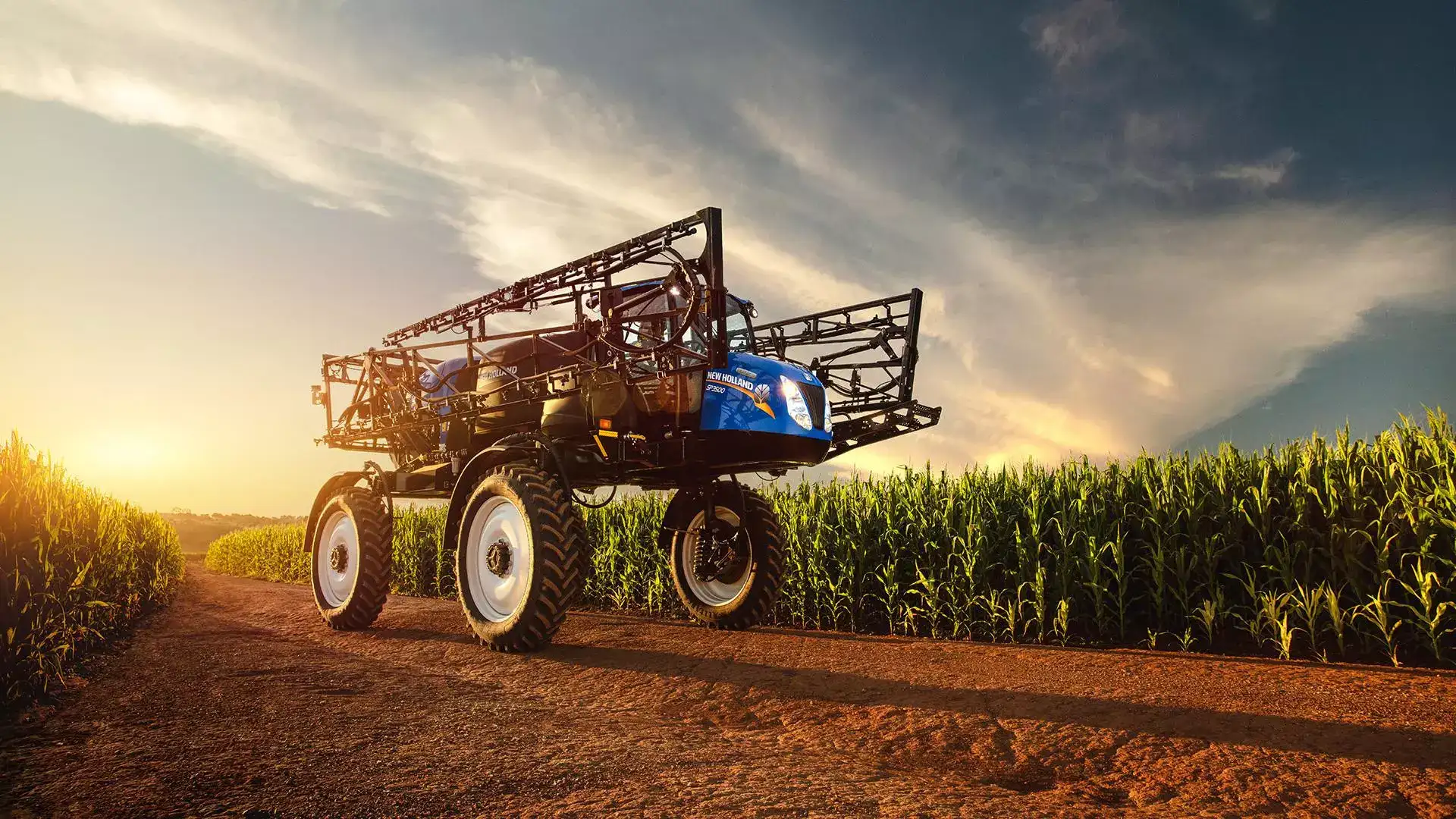 pulverizadores new holland modelo defensor 3500 hc em campo visão lateral maquina fechada