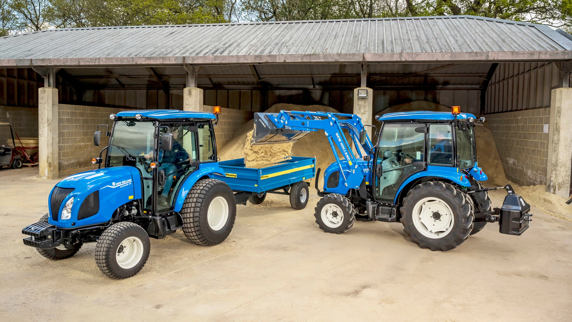 New Holland Boomer Tractors in action