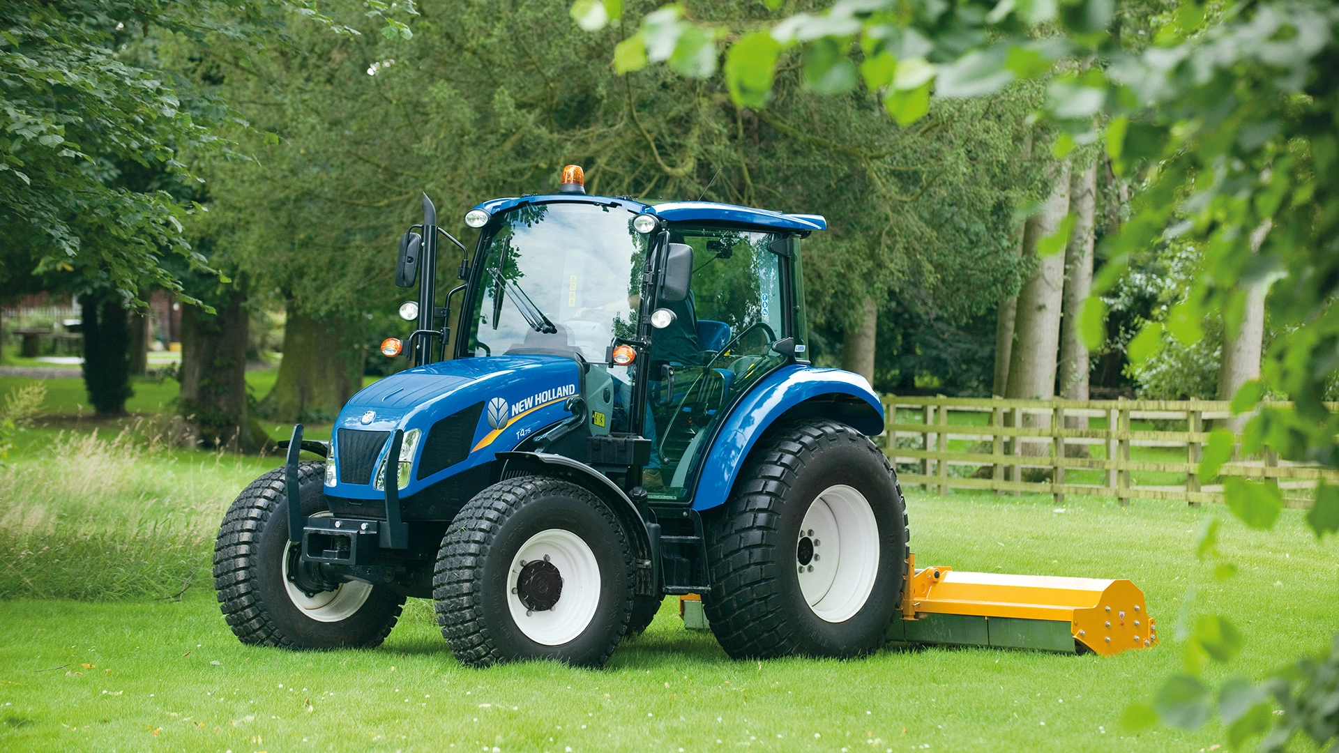 New Holland T4 tractor with a mounted mower