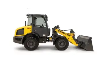 Side view of compact wheel loader.