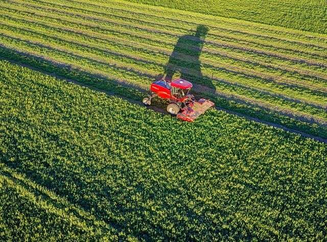 2105 windrower in shadow