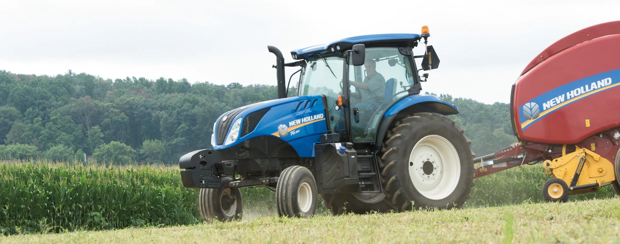 T6 tractor turning front axle in the field 