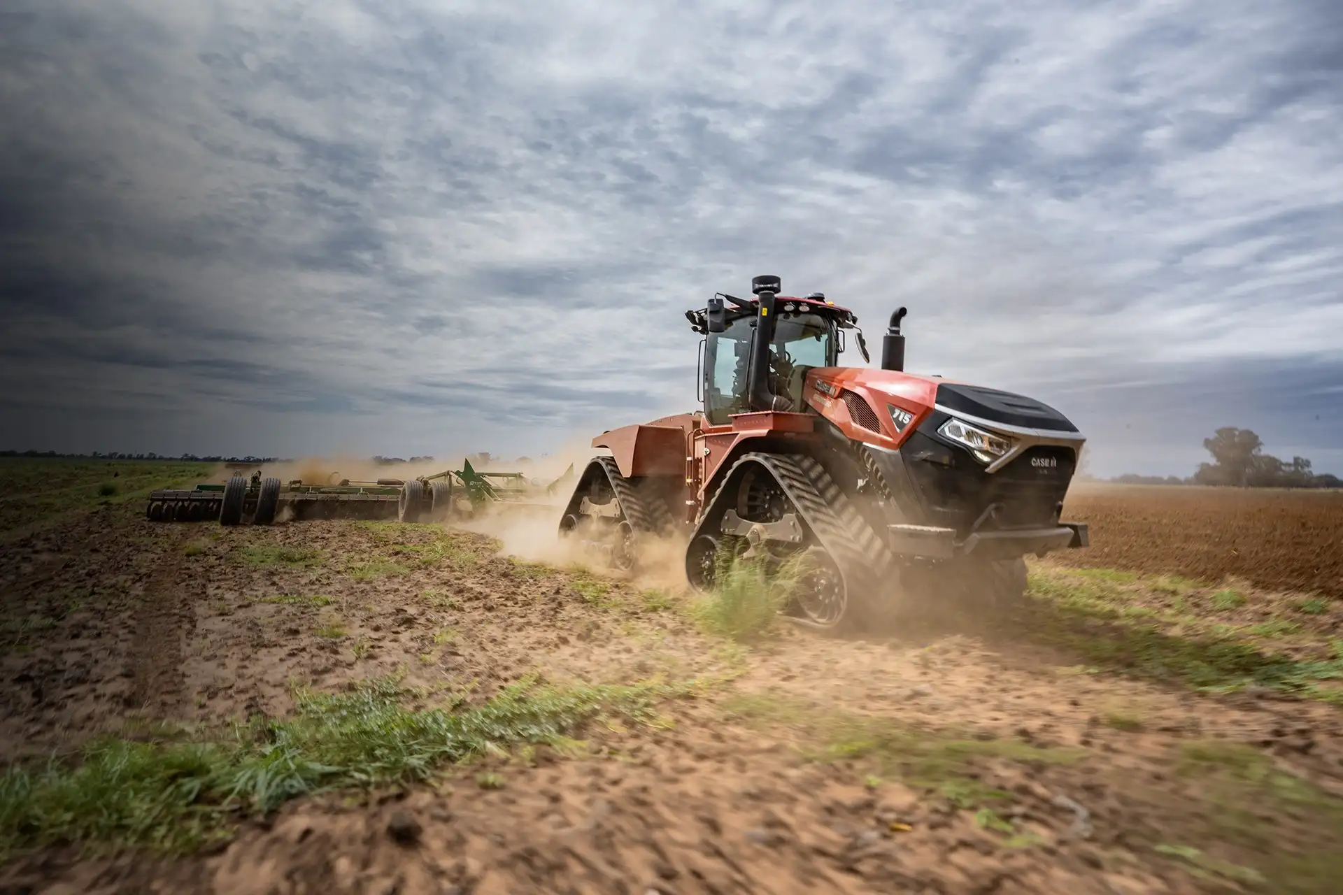 Red Case IH Steiger 715 in field with K-Line attachment working