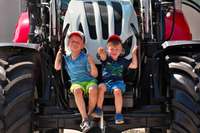 STEYR_Open_Days_Young_Visitors_on_Tractor.jpg