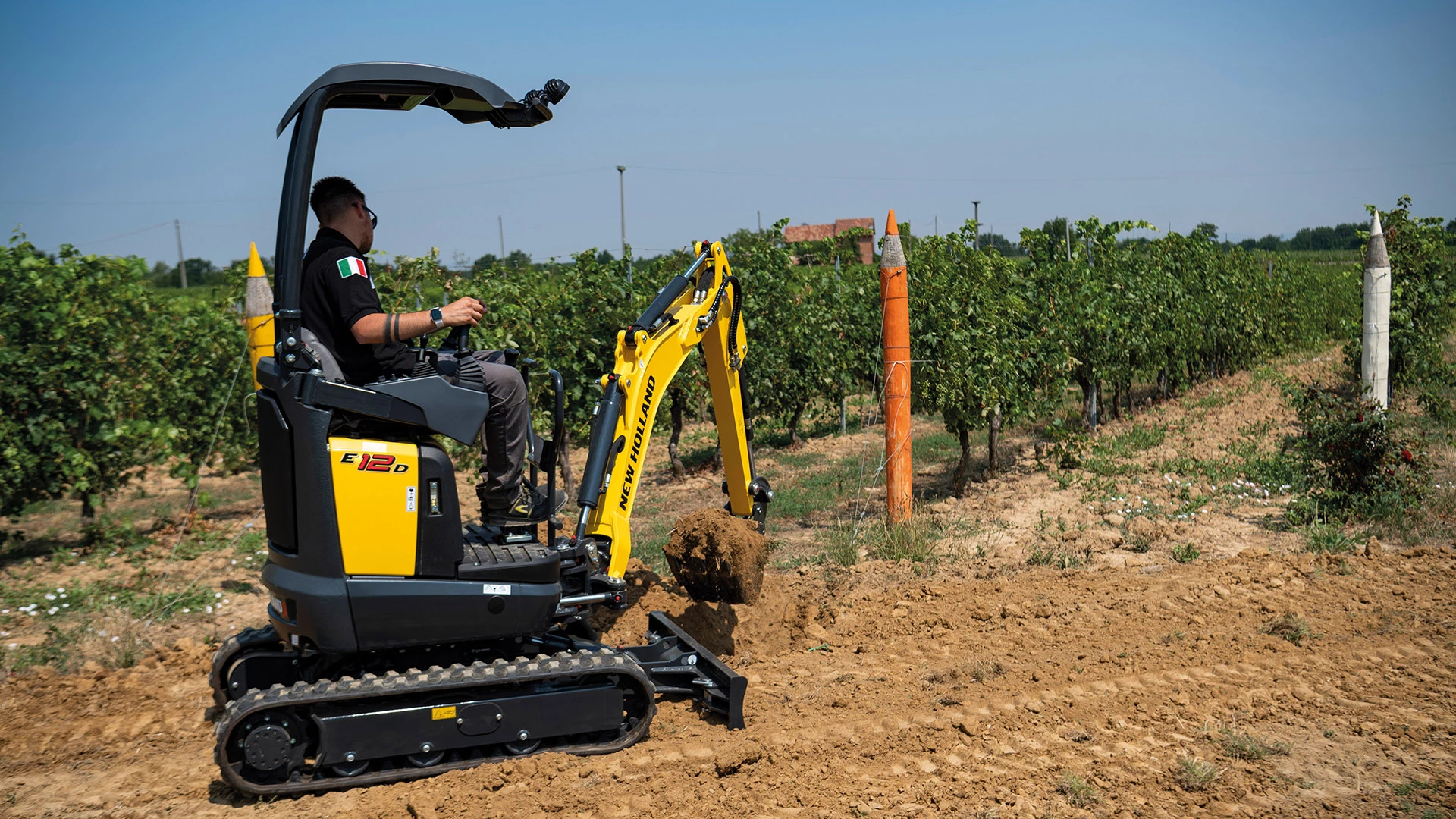 D–Series Mini Excavator working on the field