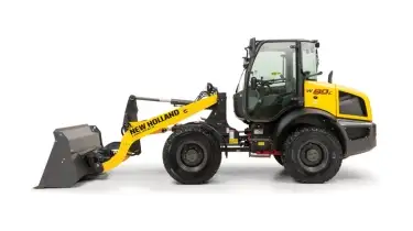 Side view of compact wheel loader.