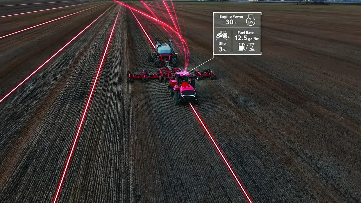 Aerial view of a Case IH tractor plowing a field with glowing red GPS guidance lines. 